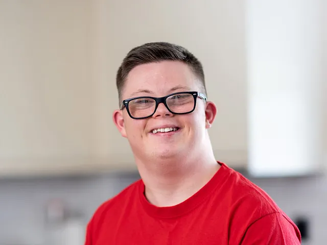 Person with Down Syndrome smiling