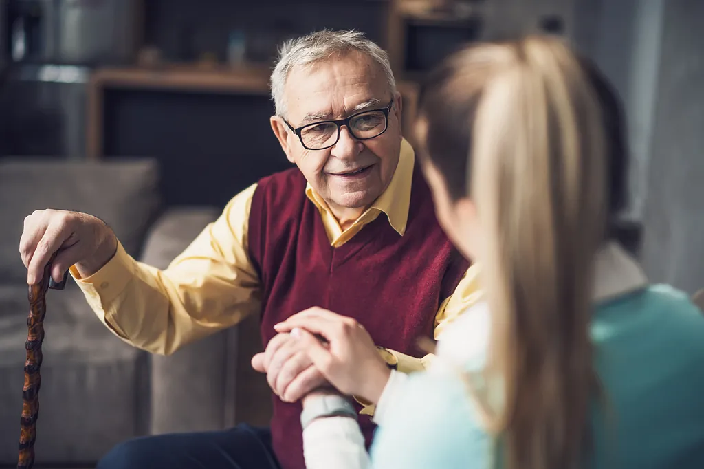 Old man with care worker